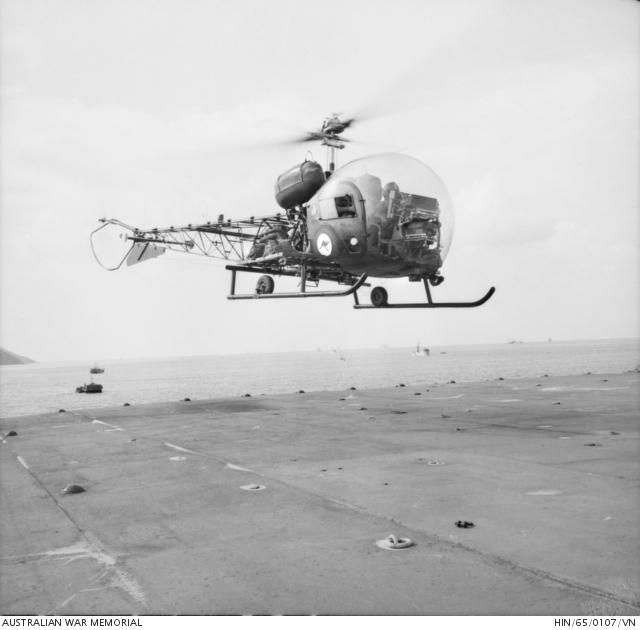 An Australian Army Bell Sioux Helicopter leaves the flight deck of HMAS Sydney, Vietnam, 1965