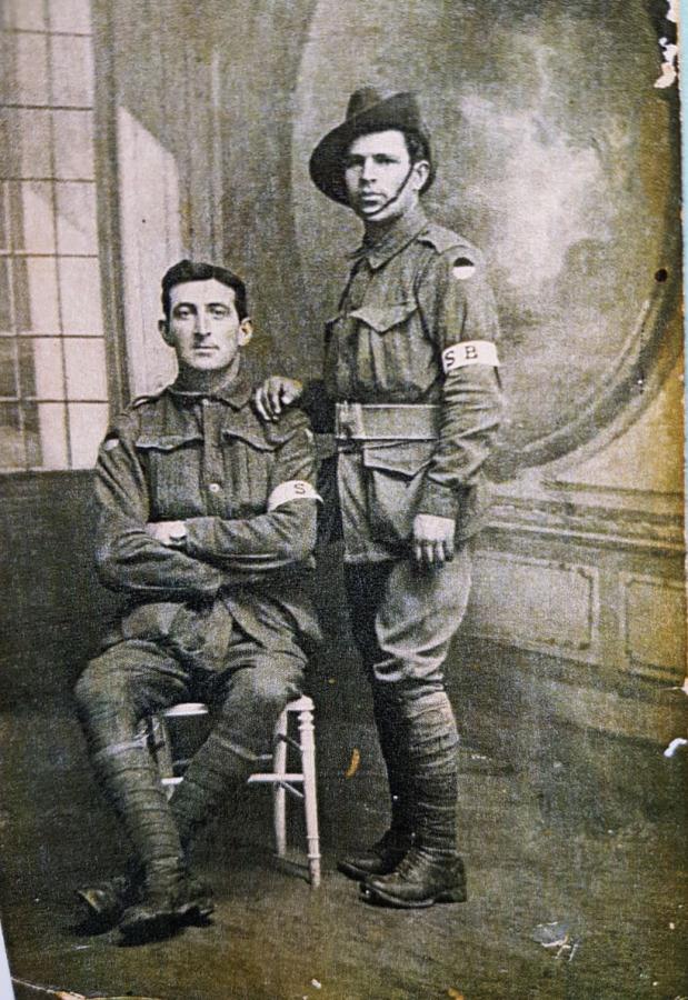 George Hurst, standing, in a studio portrait taken during the war.