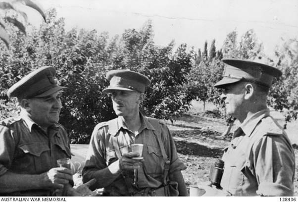 From left: Major General A.S. Allen, Brigadier F.H. Berryman , and Brigadier A.R. Baxter-Cox enjoy a moment of respite in Syria, June 1941. C48379 