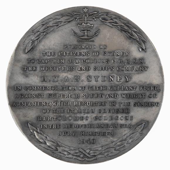 Back of silver medallion