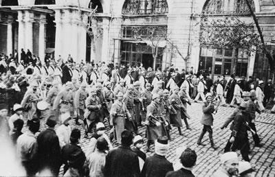 A marching band leads Turkish soldiers out of Constantinople