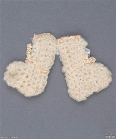 Good luck miniature crocheted woollen baby's booties belonging to Captain Herbert G Watson, No.4 Squadron AFC.