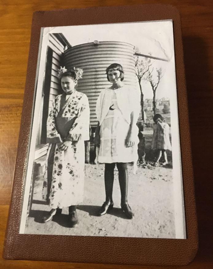 Victoria Margaret Watt as a little girl. She is pictured with two of her sisters Sis and Molly.