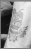detail close up of Pte Lloyd's tattoo