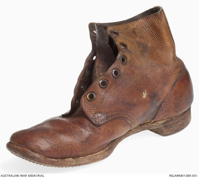 Bullet-damaged leather boot