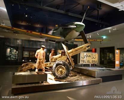The Desert Campaign display in the Second World War Galleries featuring a 25 Pounder Field Gun and Supermarine Spitfire
